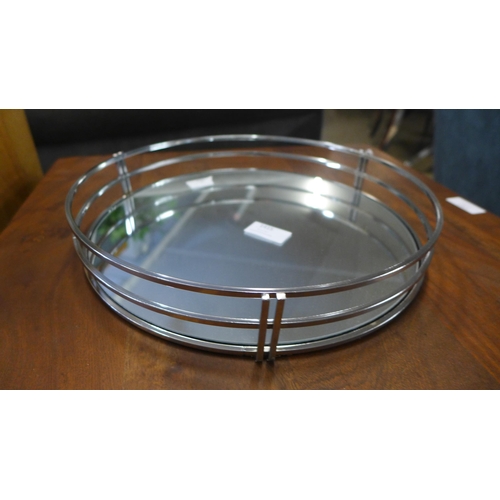 1410 - A round silver mirrored cocktail tray, 30cms (CH612808)   #