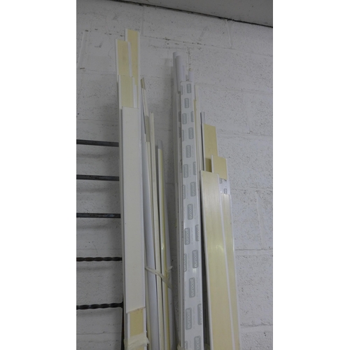 2417 - Approx 50-60 mixed lengths (3ft -7ft) of white upvc window/door frame trim