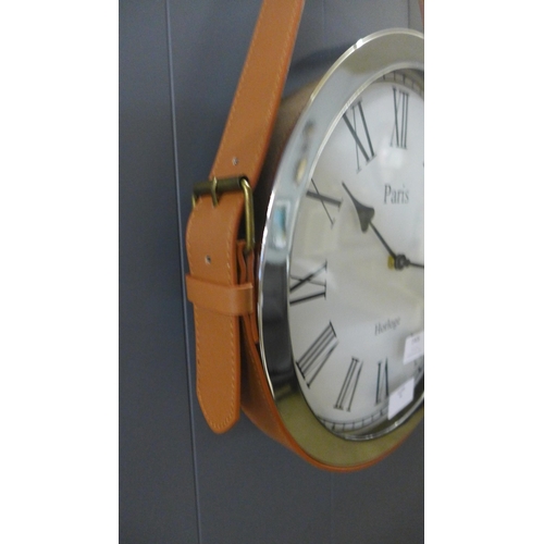 1416 - A Paris wall clock with belt strap hanger, H 57cms x 33cms (CL184112)   #