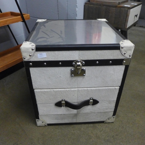 1370 - A cow skin and leather effect storage chest