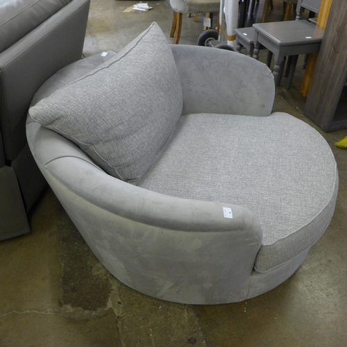 1518 - A grey velvet and textured weave upholstered swivel love seat