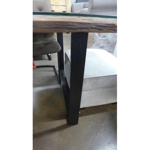 1476 - A Phoenix glass top and black steel dining table