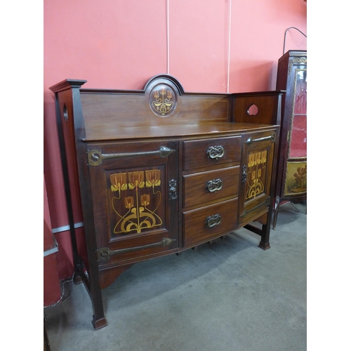 1 - Shapland & Petter, Barnstaple, an Arts and Crafts inlaid mahogany sideboard, 130cms h, 141cms w, 56c... 