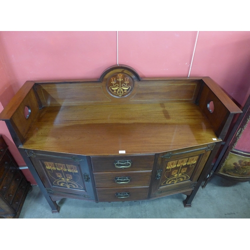 1 - Shapland & Petter, Barnstaple, an Arts and Crafts inlaid mahogany sideboard, 130cms h, 141cms w, 56c... 