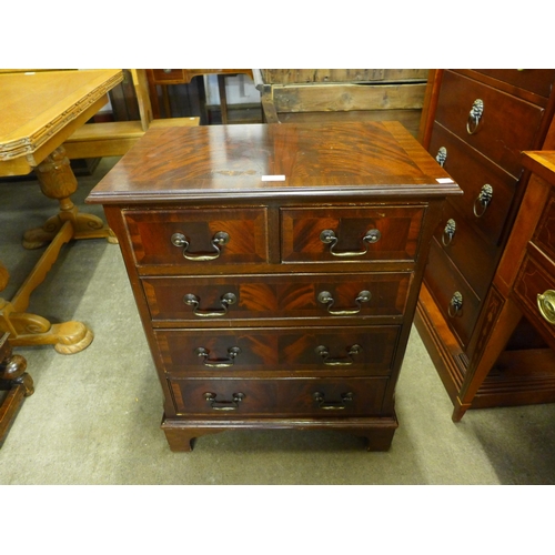 157 - A small mahogany chest of drawers