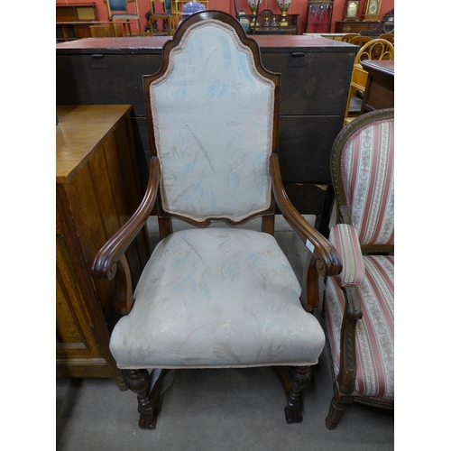 166 - A French carved walnut armchair