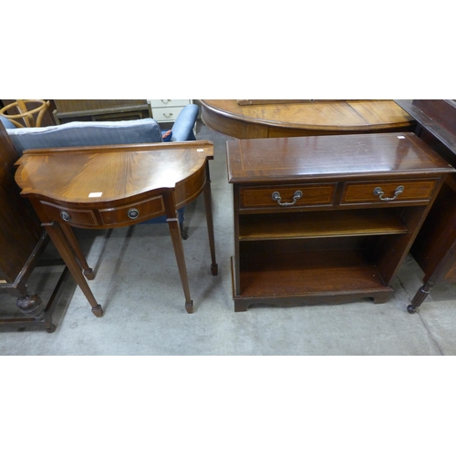 205 - A mahogany hall table and an open bookcase