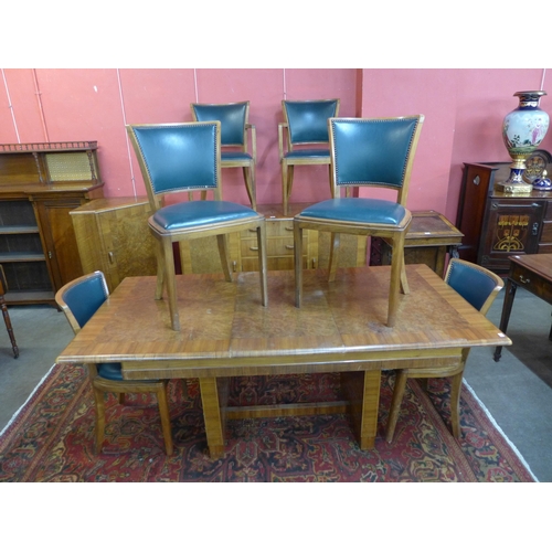 21 - A Heals Art Deco walnut and burr walnut dining suite, comprising; extending dining table, six chairs... 