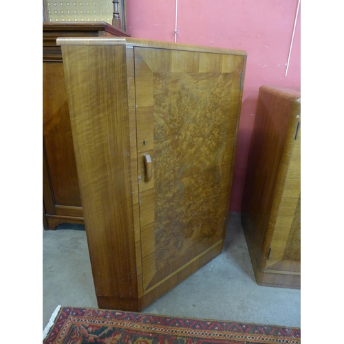 21 - A Heals Art Deco walnut and burr walnut dining suite, comprising; extending dining table, six chairs... 