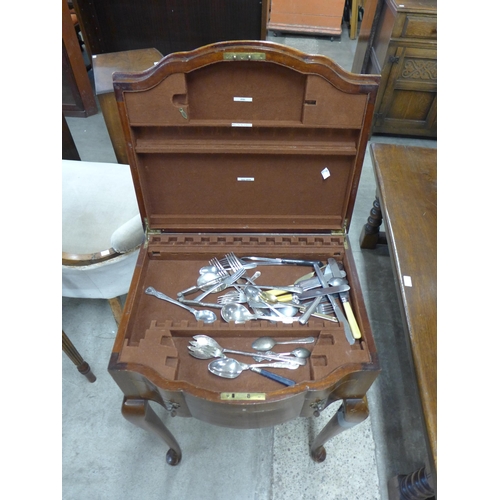 211 - An Edward VII mahogany canteen of cutlery table