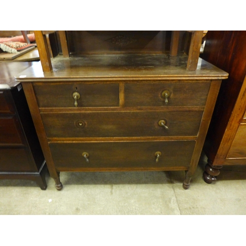 219 - An oak chest of drawers and an oak washstand