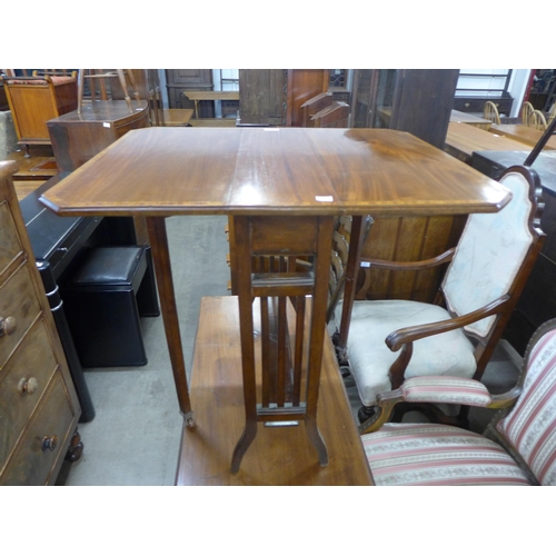 220 - An Edward VII inlaid mahogany Sutherland table