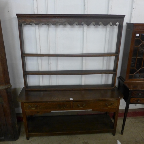 229 - A George III style oak dresser