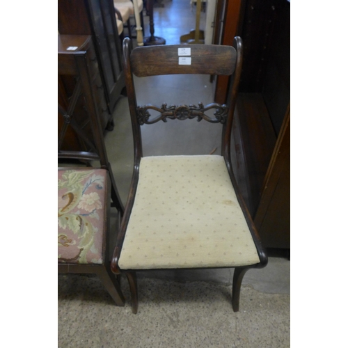 240 - A Regency rosewood sabre leg chair and three other chairs