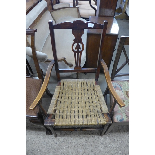 240 - A Regency rosewood sabre leg chair and three other chairs