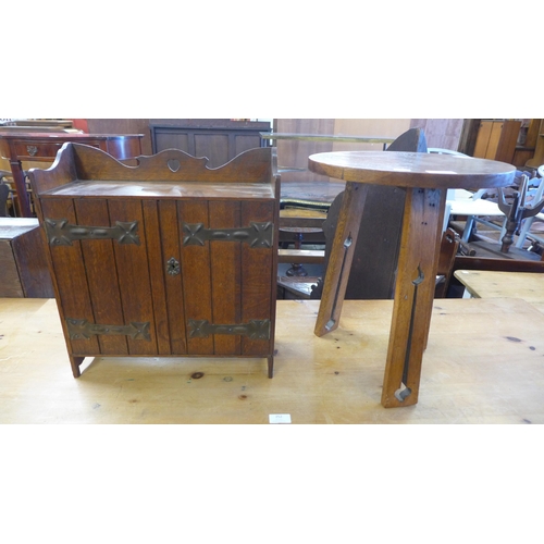 251 - An Arts and Crafts oak smokers cabinet and an Arts and Crafts oak occasional table