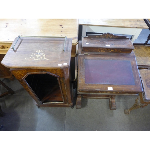 254 - A Victorian inlaid walnut Davenport and a music cabinet