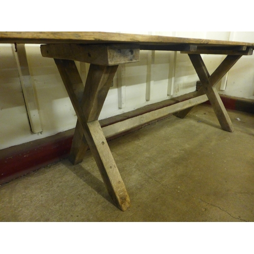 256 - A Gothic pine x-frame farmhouse refectory table