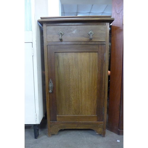 265 - An Edward VII mahogany single door cabinet