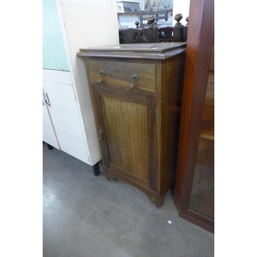 265 - An Edward VII mahogany single door cabinet