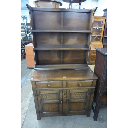 267 - A carved oak dresser