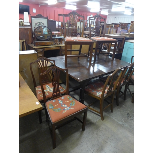 293 - An early 20th Century set of seven mahogany dining chairs in the Hepplewhite style with needlework d... 