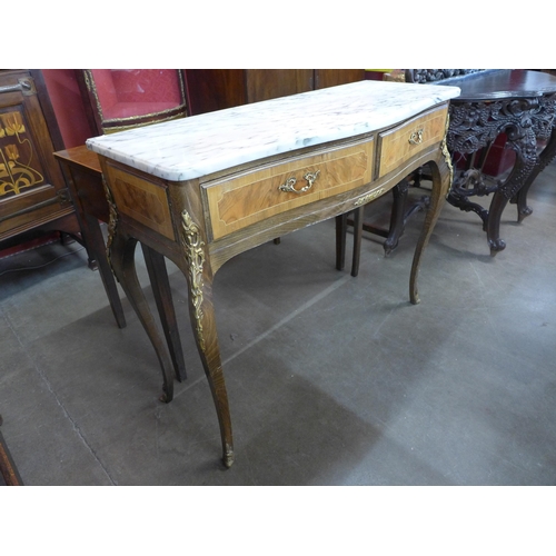 4 - A French Louis XV style inlaid walnut, gilt metal and marble topped serpentine two drawer console ta... 