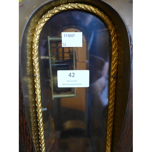 42 - A French Boulle style ebonised and gilt metal bracket clock