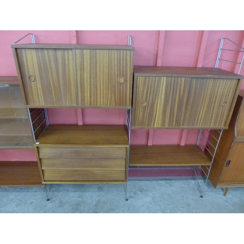 52 - A teak modular room divider