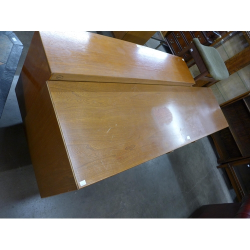 92 - An Ensign teak and elm sideboard, by Bristow & Townsend