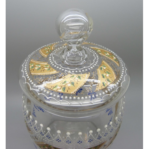 623 - A glass biscuit barrel with enamel design