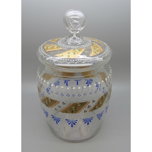 623 - A glass biscuit barrel with enamel design