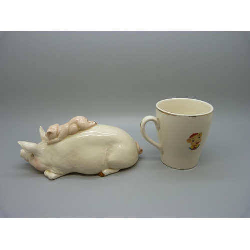 627 - A Beswick sleeping pig and piglet and a Keele Street Pinky and Perky mug