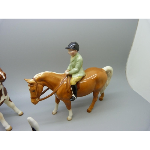 632 - A Beswick boy on pony and a Beswick girl on pony and a Ch. Wendover Billy