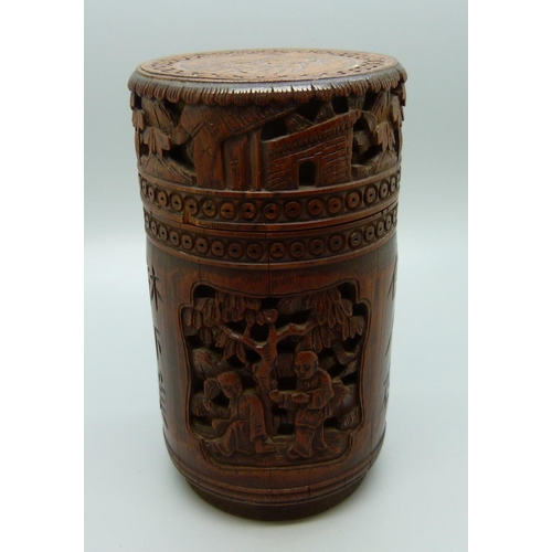 634 - A carved bamboo cannister with translation, 12.5cm