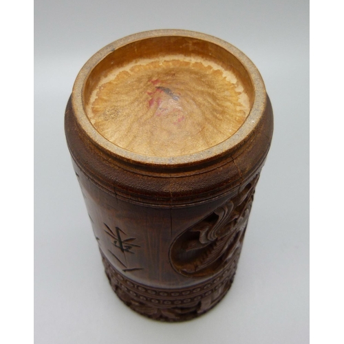 634 - A carved bamboo cannister with translation, 12.5cm