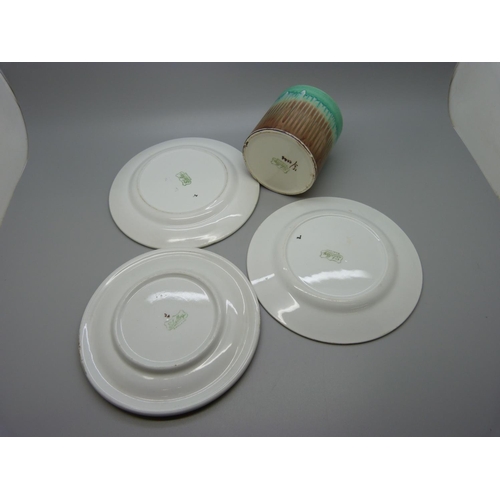 643 - Four items of Shelley dripware; teapot stand, two tea plates and a cannister