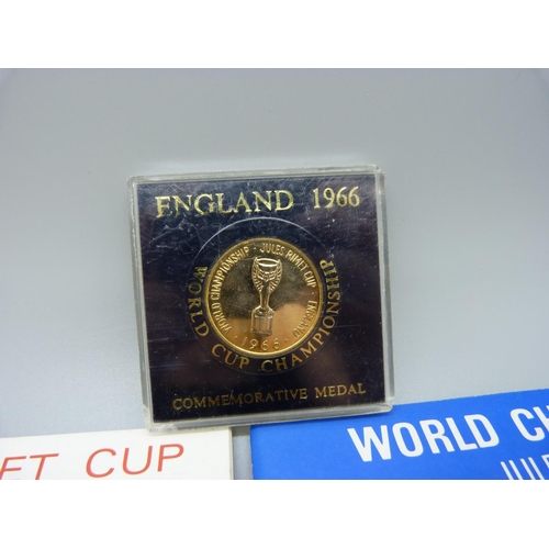 651 - A 1966 Group Stages souvenir World Cup programme, an England v West Germany World Cup Final programm... 