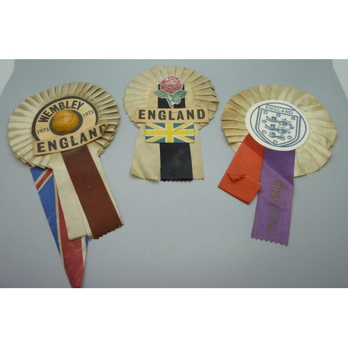 663 - Three England rosettes and one 1966-1970 pennant