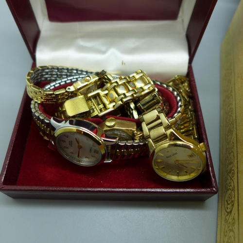 679 - Costume jewellery and wristwatches in a jewellery box