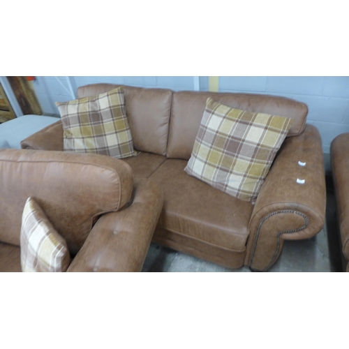 1549 - A County brown faux leather button back and studded three seater sofa and loveseat