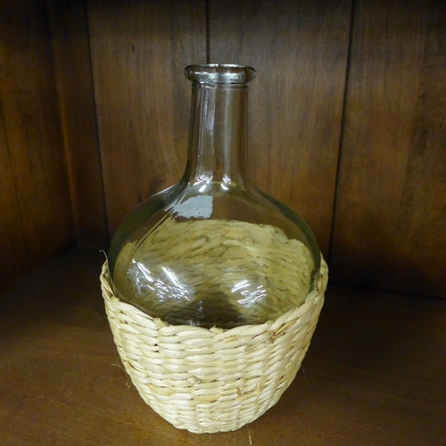 1562 - A Batanta Bohemian bottle with hand woven seagrass, H 26cms (505941 369743213)   #