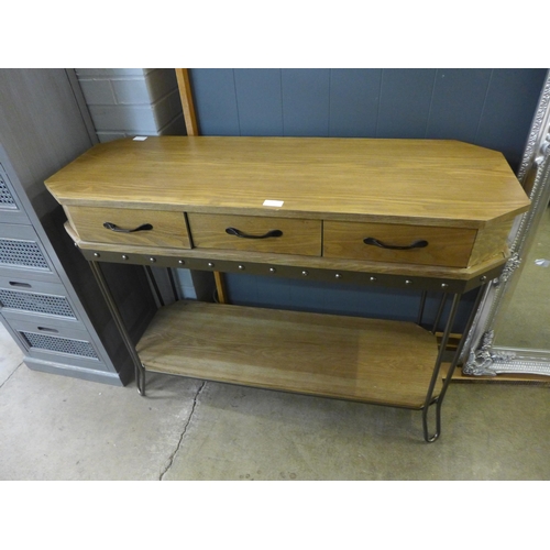 1427 - A wood and metal industrial style three drawer console table