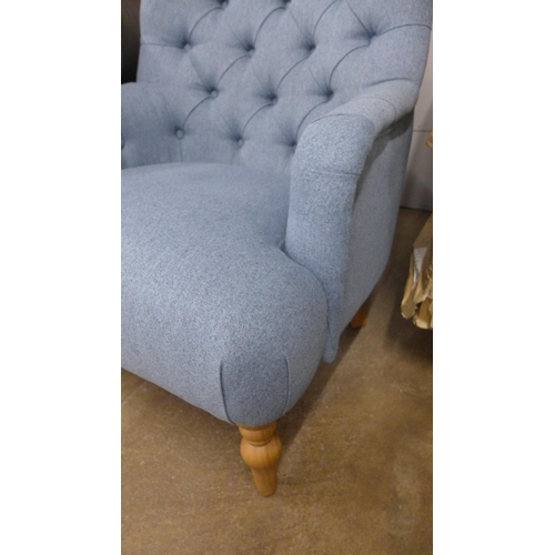 1483 - An Atlanta blue button back armchair