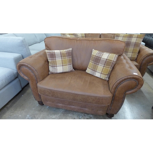 1549 - A County brown faux leather button back and studded three seater sofa and loveseat