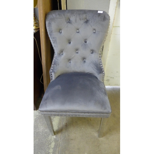 1701 - A grey velvet Chelsea chair, tear to back