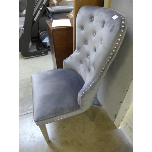 1701 - A grey velvet Chelsea chair, tear to back