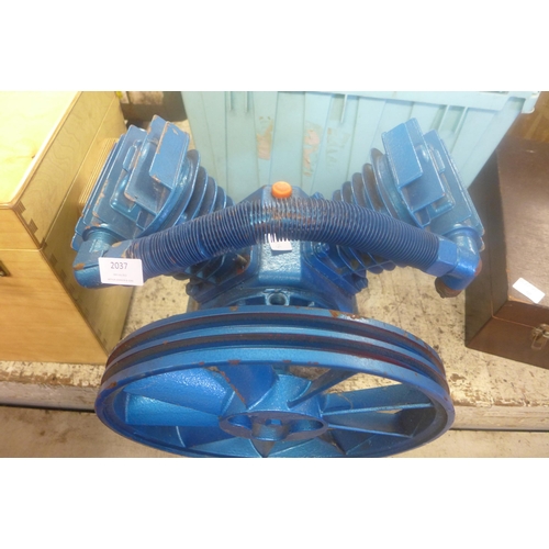 2037 - A large blue 'V' twin cylinder compressor pump