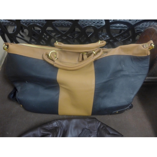 2148 - Unused weekend bag with wheels by Joy Mangano (USA) and a bag