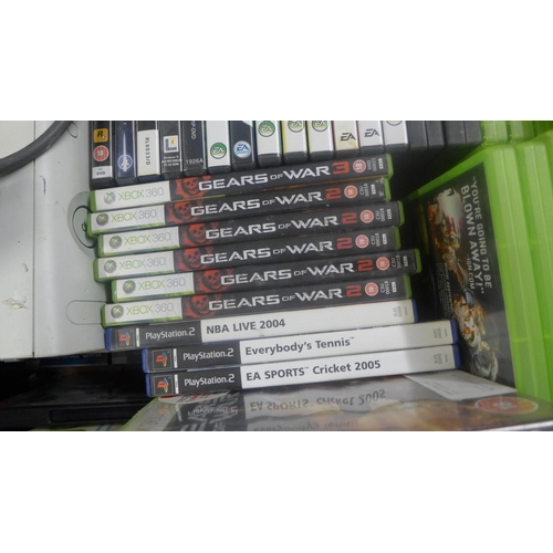 2193 - Two XBox 360 consoles and a quantity of assorted games